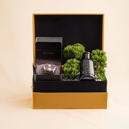 بوكس ساعة تيتان رجالية و عطر هوغو بوص