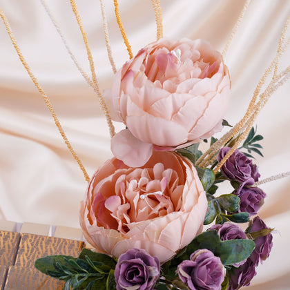 شوكولاتة آني وداني مع ورد بيوني صناعي