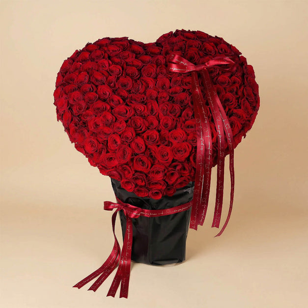 ذروة الحب | ورد أحمر على شكل قلب