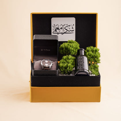 شكرا معلمي | بوكس ساعة تيتان رجالية و عطر هوغو بوص