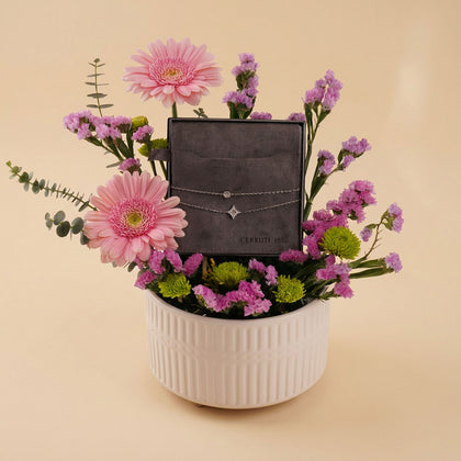 اسورة شيروتي فضية مع فازة جربيرا