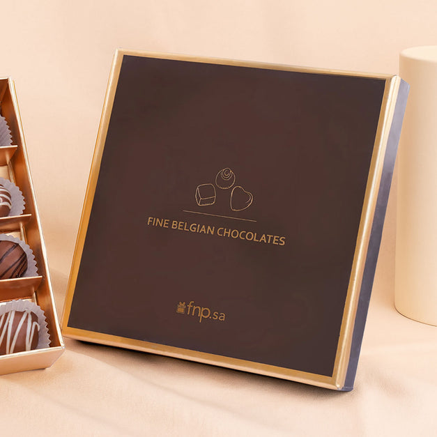 علبة شوكولاتة ترافل بلجيكية 16 قطعة بنكهة الحليب والبندق