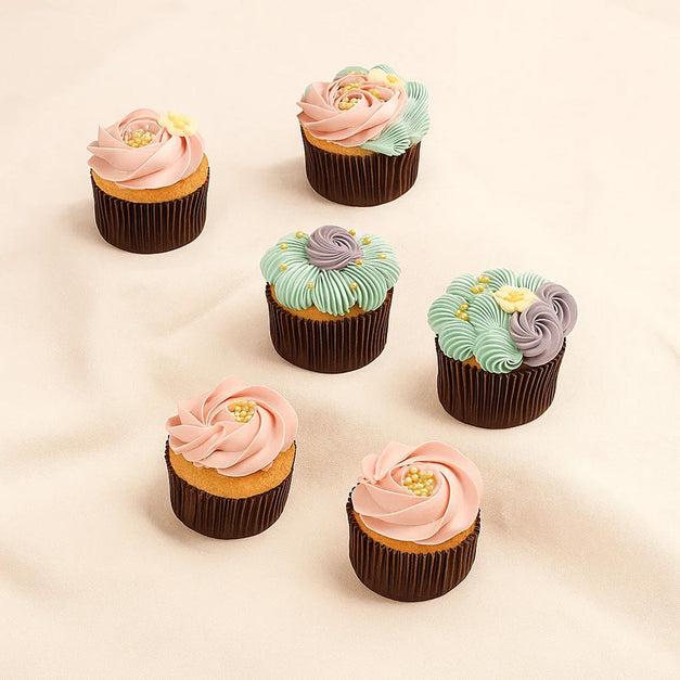 سحر الباستيل | كب كيك مزين بالكريمة