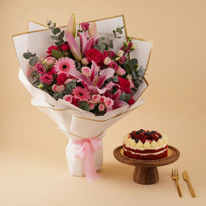 أغنيات | باقة ورد ملونة مع كيكة ردفلفت