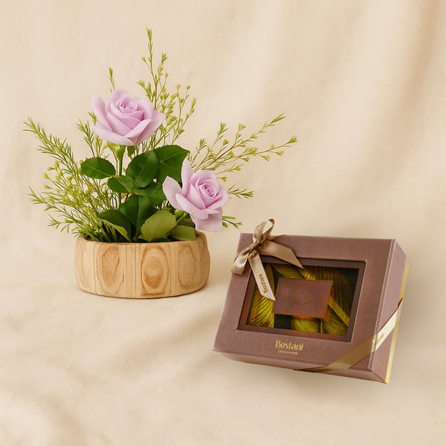 علبة شوكولاتة شكراً من بستاني و باقة ورد