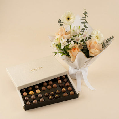 شوكولاتة آني وداني مع بوكيه الورد و الجربيرا