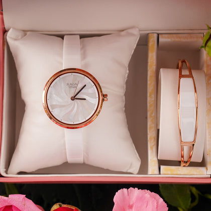 همسات الروز جولد | طقم تيتان راجا مع باقة ورد