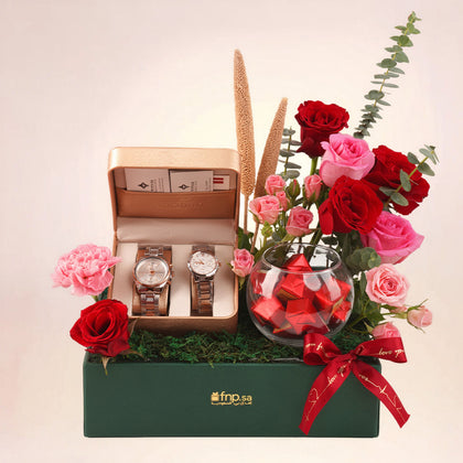 طقم ساعات تيتان للزوجين مع ورد وشوكولاتة