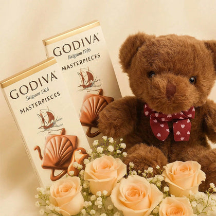 شوكولاتة جوديفا في سلة ورد مع تيدي بير