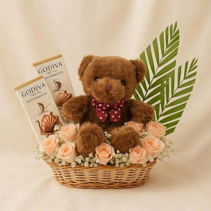 شوكولاتة جوديفا في سلة ورد مع تيدي بير